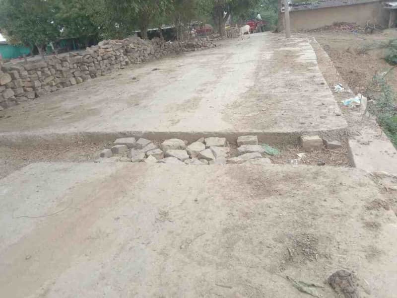 भगवानपुरा सड़क पर जल निकासी पाइप विवाद से निर्माण कार्य अटका